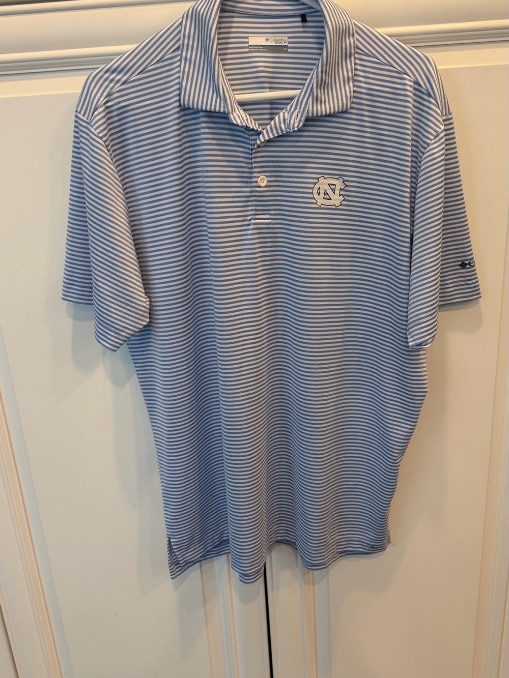 Columbia Men’s Light Blue and White Striped Polo with NC Logo